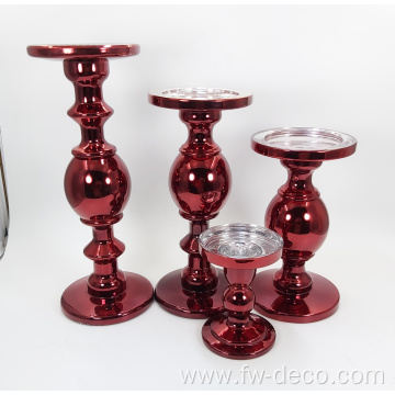 red colored large glass candlestick holder